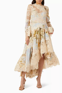 Introducing the Luminosity midi dress by Zimmermann - a romantic and artfully crafted piece. Made with floral-print silk linen organza and delicate lace trims, this dress exudes dreamy elegance. Its long-sleeved bodice and asymmetrical layered skirt adds a touch of whimsy to your wardrobe.