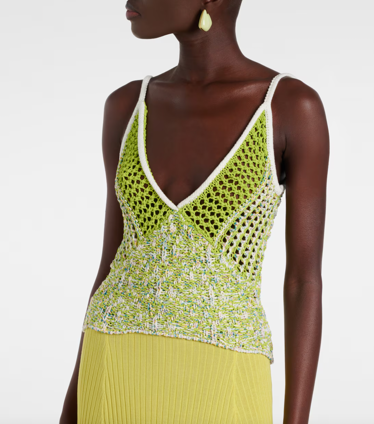 This Lace-trimmed slip dress by Christopher Esber boasts a stunning V-neck collar and delicate sleeveless design. With beautiful crochet panelling, this elegant piece is perfect for any formal occasion. Made from high-quality fabrics, it offers both style and comfort, making you the center of attention.