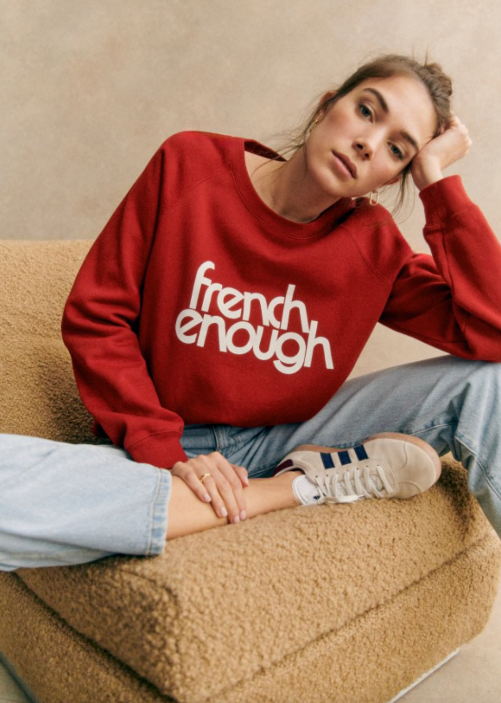 Stay comfy and stylish with this long-sleeved organic cotton sweatshirt. Show off your love for French culture with the "French Enough" print on the front, while staying cozy with the round neckline. Good for you and the environment.