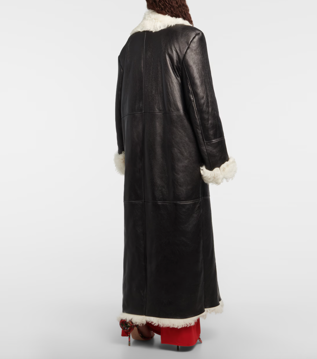 Indulge in luxury with the Magda Butrym Shearling-lined leather coat. Made with premium quality leather and lined with soft shearling, this coat offers both style and comfort. Perfect for chilly winter days, it is a must-have addition to your wardrobe. Elevate your fashion game with this sophisticated and exclusive piece.