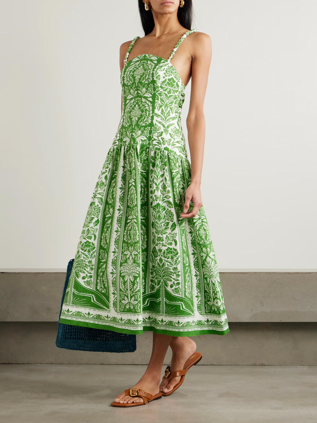 This Printed Gathered Linen Maxi Dress by FARM RIO offers a blend of effortless style and breathable comfort. Crafted from high-quality linen, its gathered design enhances the silhouette while allowing natural airflow, making it ideal for warm weather. The vibrant print adds a distinctive, expert touch, perfect for showcasing refined taste in casual or resort wear.
