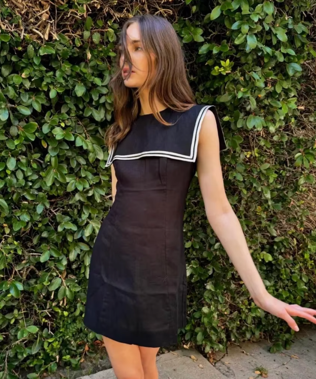 Introducing the Monroe Dress - a ‘60s-inspired mini-length shift dress. Tailored in soft midweight linen, its body-skimming silhouette and invisible side zipper offer a flattering fit. Complete with a wide square sailor-style collar and a self-covered button with a keyhole detail, this dress exudes sophistication and timeless elegance.