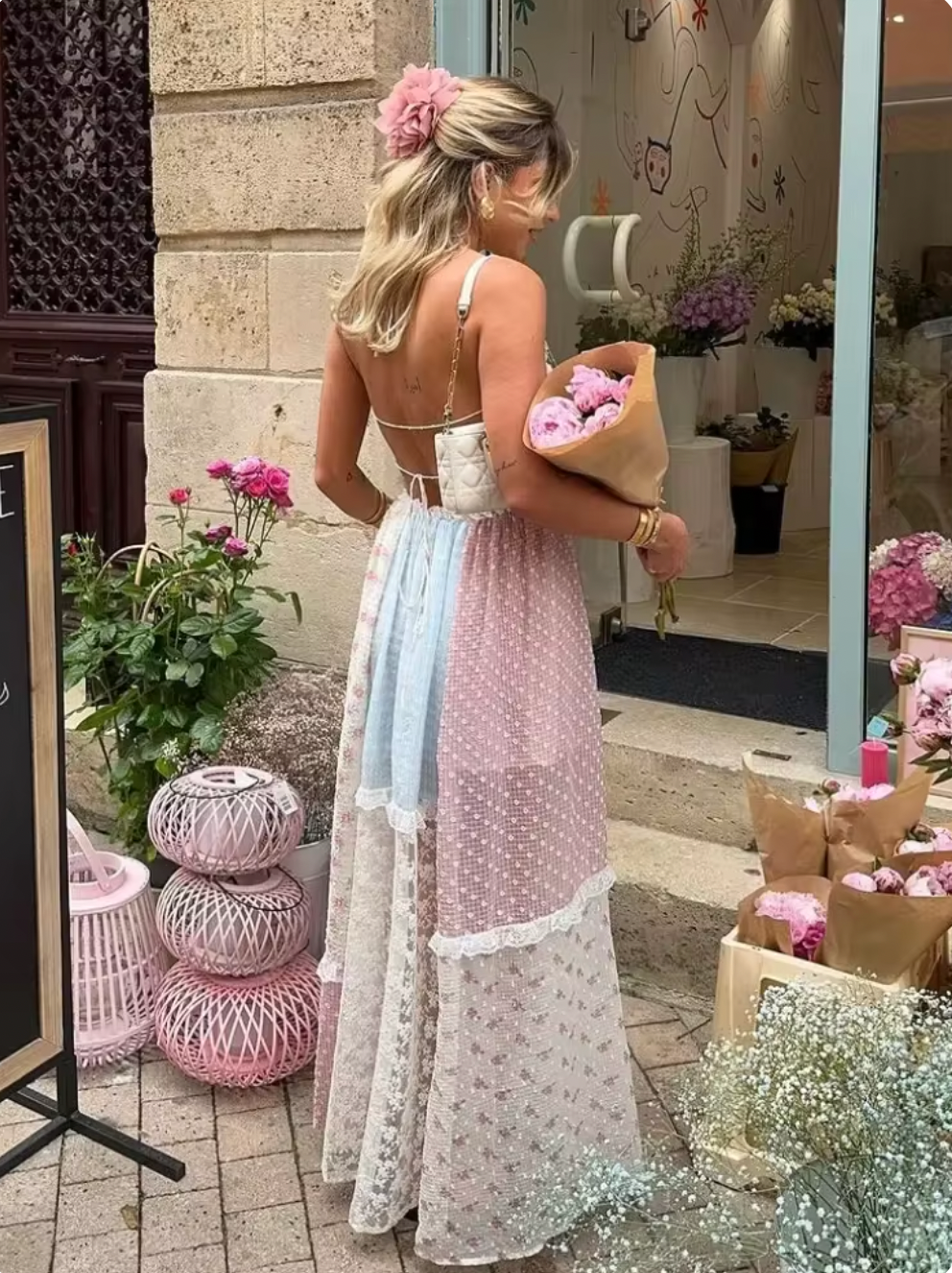 Indulge in the elegance of our Elula Maxi Dress. Its mixed print fabrication and patchwork-inspired design create a picturesque silhouette, while the lace-up back detail and feminine sweetheart-neckline add a touch of sophistication. With a fitted bodice and A-line hem, this dress is the perfect balance of comfort and style.