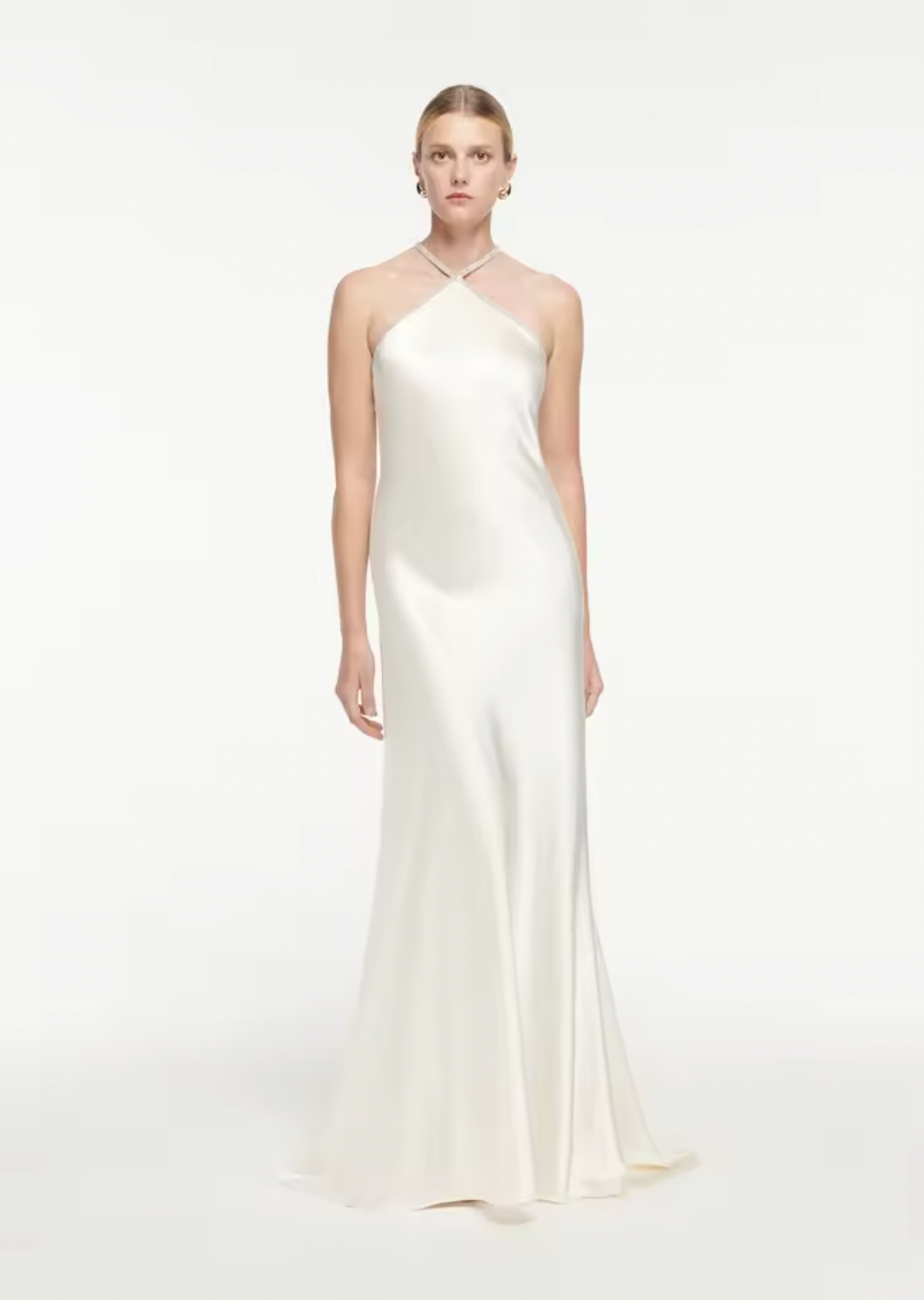 Expertly crafted from luxurious silk satin, this Embellished Gown by Roland Mouret features a stunning open back with lace-up detail and elegant A-Line silhouette. Perfect for any special occasion, this halter gown exudes timeless sophistication and will make you feel confident and beautiful.