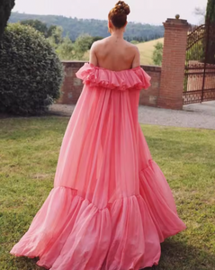 Get ready for a dreamy summer with this Off-shoulder Silk Georgette Gown from Giambattista Valli. Made with luxurious silk georgette, the fluid drape and flirty ruffle detail exude a romantic charm. Perfect for any special occasion, this exclusive gown will make you feel like a beautiful rosebud.