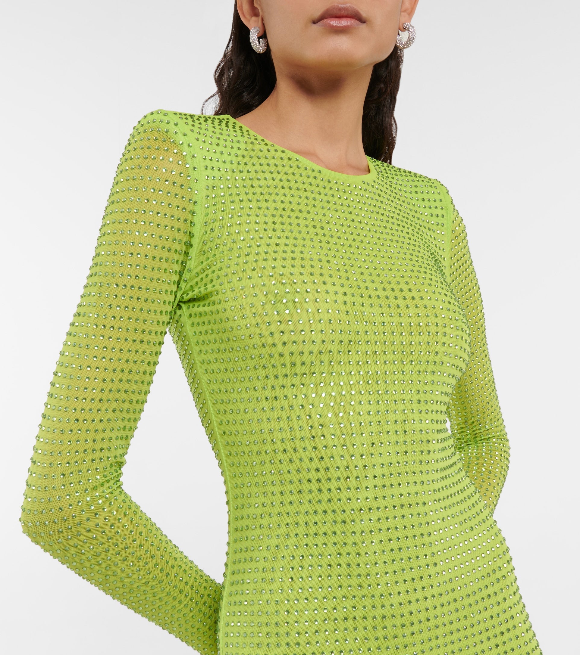 Unleash your inner shine with the Dress Nissa. This stunning green sequined dress features delicate beading and a bodycon fit that will make you stand out at any party. With long sleeves and a floor-length design, you'll be sure to turn heads and feel confident all night long.