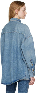 Take risks and make a statement with The Birdie Denim Shirt from KHAITE. Crafted from non-stretch denim with fading throughout, this shirt features a spread collar, button closure, and flap pockets for a touch of adventure. With a shirttail hem, dropped shoulders, and tortoiseshell hardware, this 100% cotton shirt is perfect for those who aren't afraid to stand out.