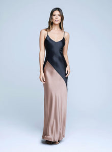 Upgrade your style with effortless elegance in the Dress Serita. This maxi slip dress is made of luxurious pink silk charmeuse, enhancing your silhouette with its bias-cut design. The clean V-neckline and adjustable spaghetti straps add versatility and comfort. Suitable for any occasion, this dress will bring a touch of sophistication to your wardrobe.