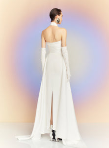 The dramatic silhouette of Solace London's 'Rumi' gown will ensure you'll make a memorable entrance. It's cut from stretch-crepe to hug your figure with glossy satin-twill that wraps around the neck and waist before falling at the sides to an asymmetric hem. Style yours with glittering earrings and elbow-length velvet gloves.