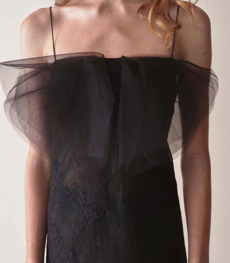 Experience glamour and sophistication with the Aurina Dress. This French niche design dress features a black halter top and semi-transparent gauze fabric, evoking a sense of elegance and sensuality. The strapless design adds a touch of sexiness, making this a must-have for any fashion-conscious woman. Elevate your wardrobe with this stunning long dress!