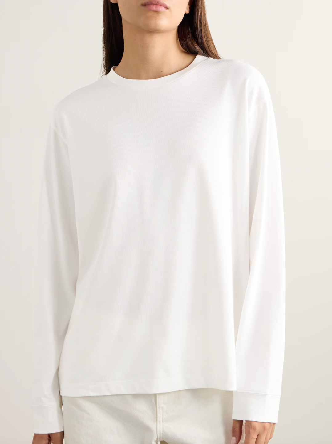 Crafted from premium cotton-jersey, the Ciles T-shirt embodies The Row's philosophy of timeless design and exceptional quality. Its relaxed silhouette offers effortless versatility—pair it with tailored trousers for polished sophistication, tuck it into denim for casual elegance, or layer it under midi skirts for refined dimension. 