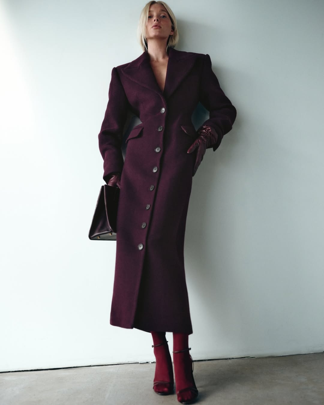 Elevate your outerwear collection with this Italian wool blend topcoat by Helsa, crafted for timeless sophistication. The front button closure and structured shoulder padding create a polished silhouette, while buttoned cuffs add refined detail. Practical breast welt and side flap pockets keep essentials within reach, and the darted waist design flatters your frame with subtle shaping. Constructed from luxurious brushed twill fabric, this coat delivers both comfort and durability for seasons of wear. 