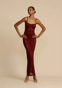 Elevate your evening look with Margot Lace Dress. This vintage-inspired lace dress in deep Wine exudes seductive allure and classic glamour. Featuring a semi-sweetheart neckline and a floor-length maxi with a center back split, Margot compliments your curves and allows for custom adjustments with gold fastenings on the shoulder straps. Lined at the bust for coverage and support, Margot is the perfect blend of comfort and sophistication.