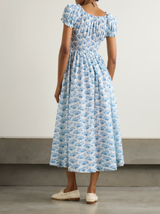 Experience effortless romance with the Ashlynn midi dress by DÔEN. Crafted from breathable organic cotton-voile, its all-over floral print captures a timeless, delicate charm. The shirred bodice offers a comfortable fit, while adjustable ties at the neckline and waist allow you to tailor the silhouette to your liking. Perfect for warm days and graceful evenings, this dress brings Southern Californian ease to your wardrobe with eco-friendly elegance.