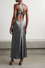 Load image into Gallery viewer, Unleash your adventurous side with the Reformation Casette Maxi Dress. Made from luxurious silk-charmeuse, it features a bold cutout design that exudes confidence. This gray dress is perfect for making a statement at any event. Take the risk and stand out in style!
