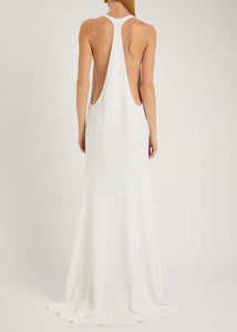 Experience modern sophistication with the Marcel crepe maxi dress by Jacquemus. Its sleek racerback silhouette and expertly crafted panels gently contour your figure, while the smooth crepe fabric flows gracefully to the floor. Perfect for minimalist sandals and delicate jewelry, this dress combines sporty elegance with subtle glamour, making it an effortless choice for refined, polished looks.