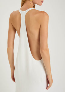 Experience modern sophistication with the Marcel crepe maxi dress by Jacquemus. Its sleek racerback silhouette and expertly crafted panels gently contour your figure, while the smooth crepe fabric flows gracefully to the floor. Perfect for minimalist sandals and delicate jewelry, this dress combines sporty elegance with subtle glamour, making it an effortless choice for refined, polished looks.