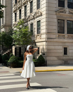 Elevate your wardrobe with the Isabelli Midi Dress. This white dress embodies cherrie mademoiselle chic, giving you a taste of Parisian style. Perfect for any occasion, this dress exudes elegance and sophistication. Embrace luxury and elevate your style with this must-have piece.