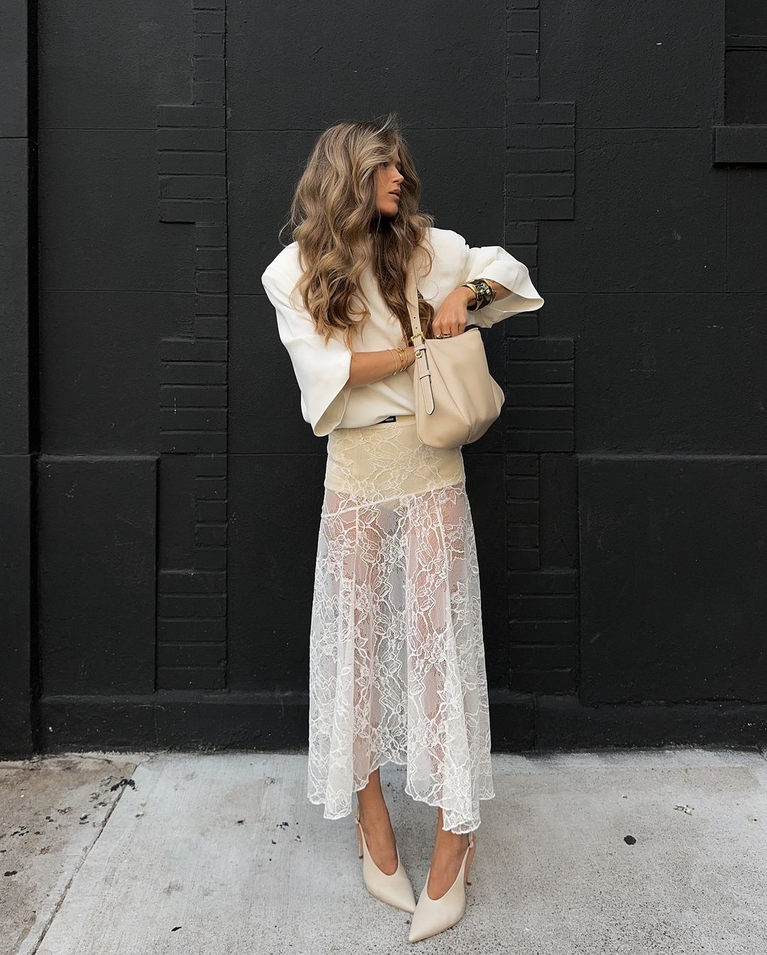 The Iris Lace Skirt is the perfect combination of sexy and playful. Made with white lace, it's perfect for beach days or dressing up for a holiday. This maxi skirt features a high waist for a flattering fit and a see-through design for a touch of allure. Beach please!