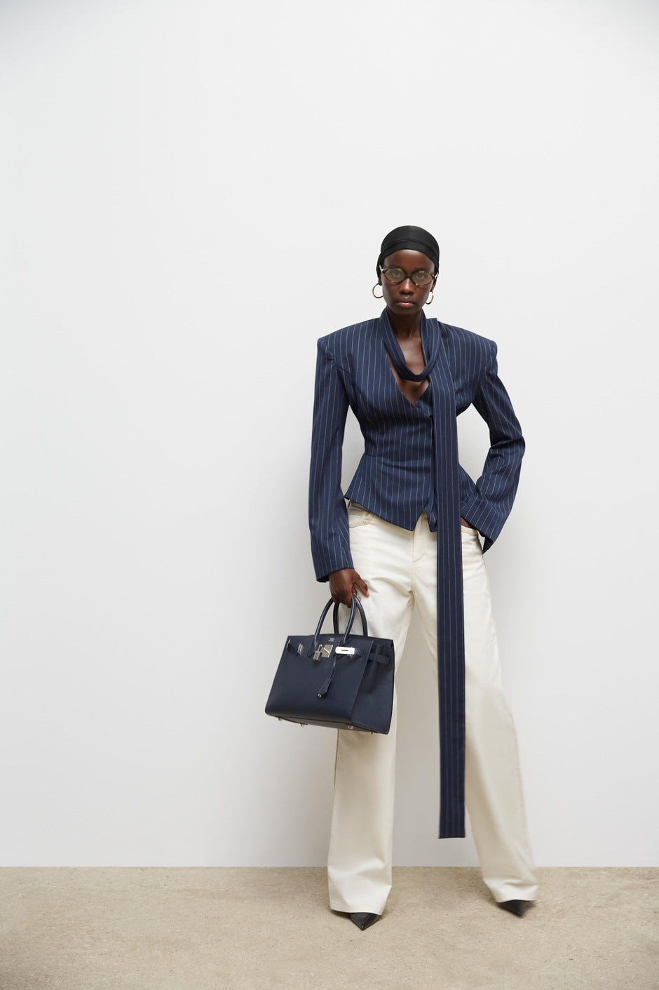 The Charlotte Jacket transforms your everyday style with its striking two-piece polka dot design. This sophisticated set pairs a commanding stand collar jacket with coordinating shorts, delivering effortless elegance for any occasion. Long sleeves and a relaxed silhouette create a polished look that doesn't compromise on comfort, making it ideal for weekend outings or evening plans. The playful dot pattern adds personality to your wardrobe while maintaining versatility across multiple settings. 