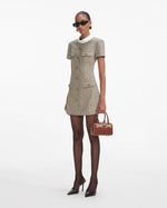 Load image into Gallery viewer, Experience the ultimate in luxury with the Check Wool Mini Dress by Self-Portrait. Fully lined and featuring a faux front button closure, this dress offers both convenience and sophistication. The midweight twill fabric is complemented by padded shoulders, creating a chic and bold silhouette. Plus, the 4-pocket design adds functionality to this stylish piece.
