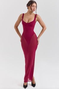 Indulge in luxury with the Robina Maxi Dress. This enchanting dress exudes elegance and allure in a rich Wine hue. The mesh design hugs your body, making every entrance unforgettable. Elevate your style and captivate all with this show-stopping piece.