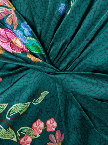 Elevate your wardrobe with the Gwen Twisted Draped Floral-print Silk Maxi Dress in Terrazzo by Saloni. Crafted from luxurious silk, it offers a flattering crew neckline and a uniquely twisted waist that enhances your silhouette. The straight skirt adds elegant movement, making it perfect for both daytime events and evening occasions. Experience comfort and style in one stunning dress designed to turn heads effortlessly.
