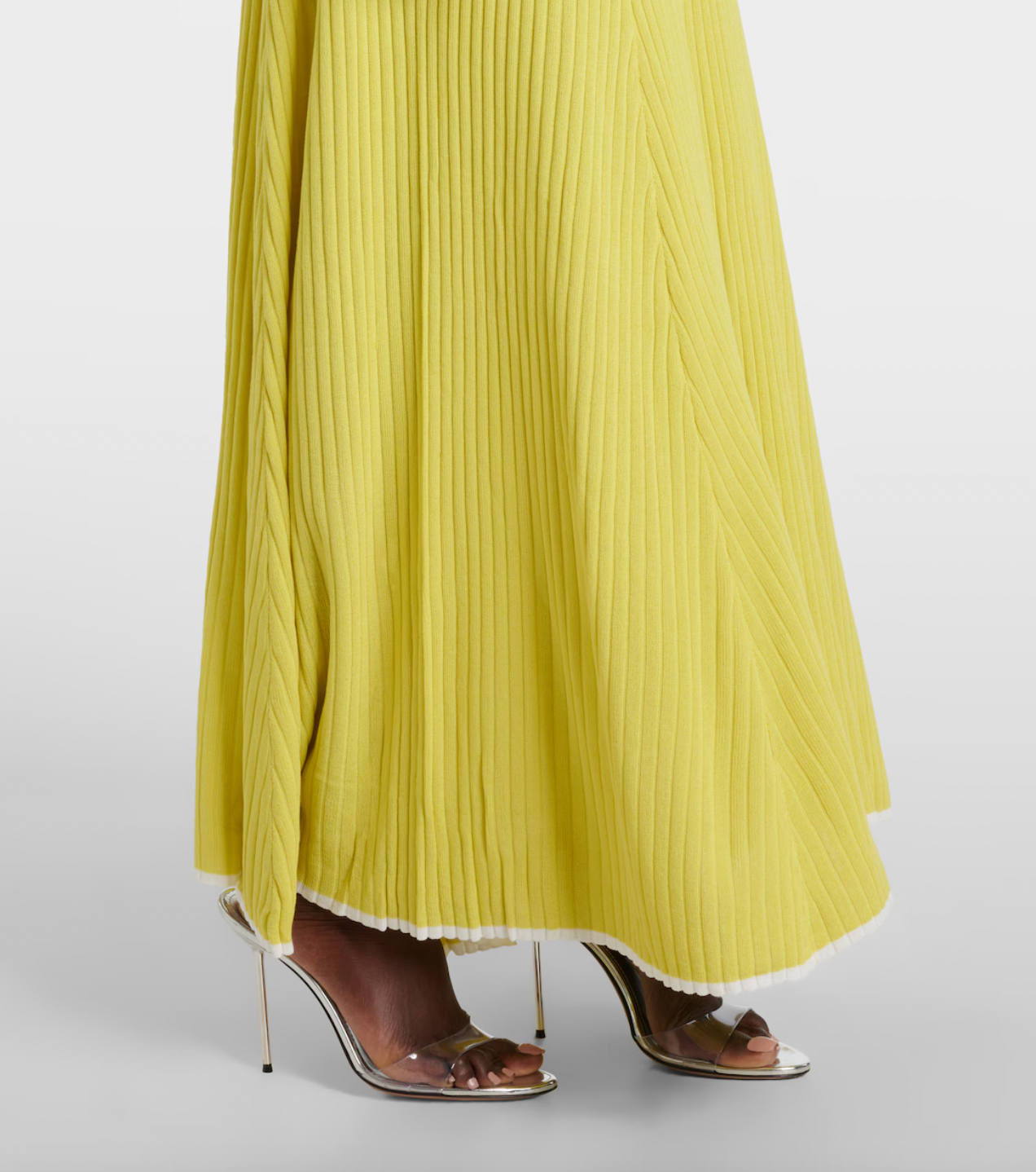 This Lace-trimmed slip dress by Christopher Esber boasts a stunning V-neck collar and delicate sleeveless design. With beautiful crochet panelling, this elegant piece is perfect for any formal occasion. Made from high-quality fabrics, it offers both style and comfort, making you the center of attention.