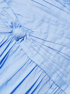 The Agatha Poplin Midi Dress by Aje features a flattering gathered, knotted waist that accentuates your silhouette. Crafted from soft cotton-poplin, it offers gentle pleats that add volume and flow elegantly to a midi length. In a versatile Powder Blue shade, this dress pairs beautifully with gold, silver, or pearl accessories, making it a perfect choice for both casual and refined occasions.
