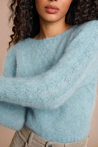 Indulge in the cozy comfort of our Pull Marcelina! Made from a wool blended fabric, this pullover is perfect for chilly days. The solid color and knitted design add a touch of style to your casual look. Get ready to stay warm and fashionable all season long!