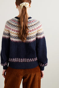 Introducing the Amble Cardigan by DÔEN. Made with a classic Fair Isle knit design, this cardigan provides both style and warmth. Perfect for any occasion, the Amble Cardigan is a versatile addition to any wardrobe.