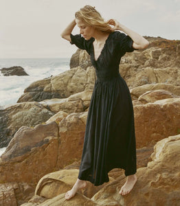 In a soft, lightweight blend of organic cotton and viscose, the Ischia Dress—a Favorite Character that made its debut in Spring 2021 and remains a bestseller—features double-puffed elbow-length sleeves and a scoop neckline accented with a functional center tie. A smocked bodice gives way to a full, ankle-grazing skirt, while a waist tie allows you to adjust the fit. Petite ruffles adorn the sleeve cuffs and neckline.