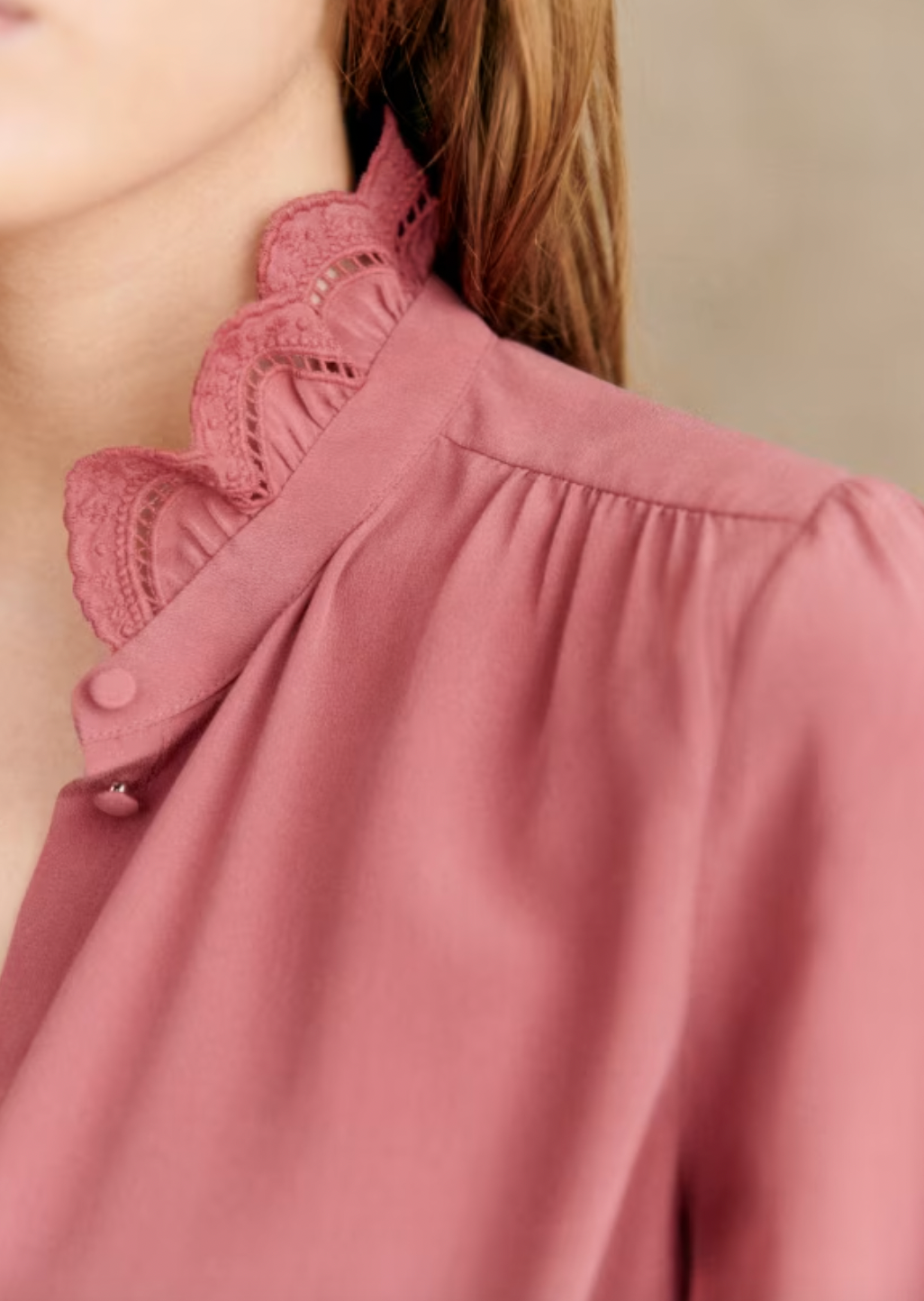 Experience elegance and sophistication with the Chloe Blouse! This long sleeve shirt features a high collar and stunning embroidered band on the placket and collar. The covered buttons add a touch of luxury to this must-have piece. Elevate your wardrobe with this timeless and stylish blouse.