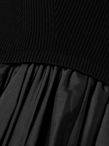 The Kenlie Ribbed-Knit and Taffeta Midi Dress by Simkhai combines a sleek, fitted bodice with a voluminous taffeta skirt that maintains its fullness thanks to soft pleats and a charming bubble hem. This elegant design offers a flattering silhouette that stays graceful whether you’re standing or sitting. Perfect for special occasions, pair it with pumps and understated jewelry to complete a sophisticated and captivating look.