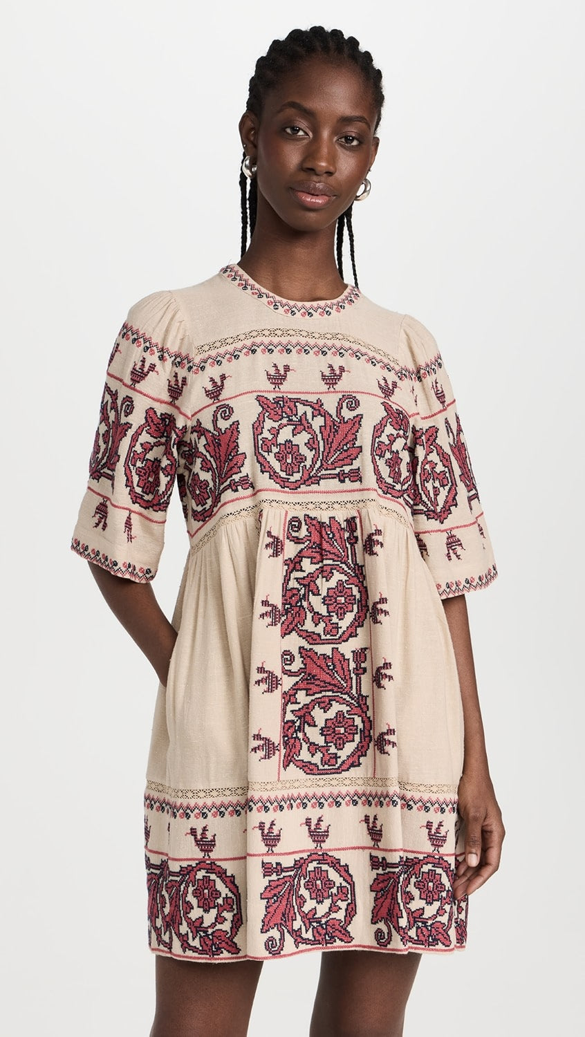 Indulge in elegance with the Beena Crochet Mini Dress by SEA. Crafted with delicate cross stitching embroidery and short sleeves, this dress boasts a mini silhouette for a touch of sophistication. Perfect for any occasion, elevate your wardrobe with this exclusive piece.