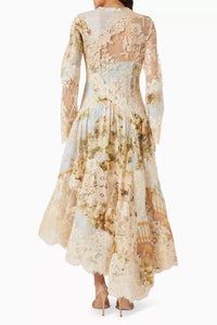 Introducing the Luminosity midi dress by Zimmermann - a romantic and artfully crafted piece. Made with floral-print silk linen organza and delicate lace trims, this dress exudes dreamy elegance. Its long-sleeved bodice and asymmetrical layered skirt adds a touch of whimsy to your wardrobe.