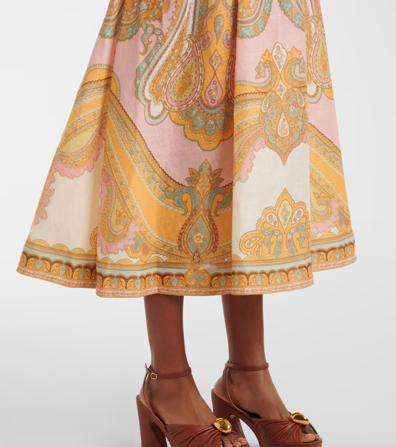 Elevate your wardrobe with the Maxine Picnic paisley linen bustier dress from Zimmermann. This midi-length dress showcases a timeless paisley placement print on breathable linen, highlighting a fitted bustier with delicate gathering and flat piping for a flattering silhouette. Self-tie straps offer adjustable comfort, while side seam pockets add practical charm. Perfect for warm days and stylish gatherings, this dress effortlessly combines elegance and ease.