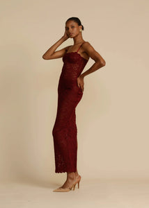 Elevate your evening look with Margot Lace Dress. This vintage-inspired lace dress in deep Wine exudes seductive allure and classic glamour. Featuring a semi-sweetheart neckline and a floor-length maxi with a center back split, Margot compliments your curves and allows for custom adjustments with gold fastenings on the shoulder straps. Lined at the bust for coverage and support, Margot is the perfect blend of comfort and sophistication.