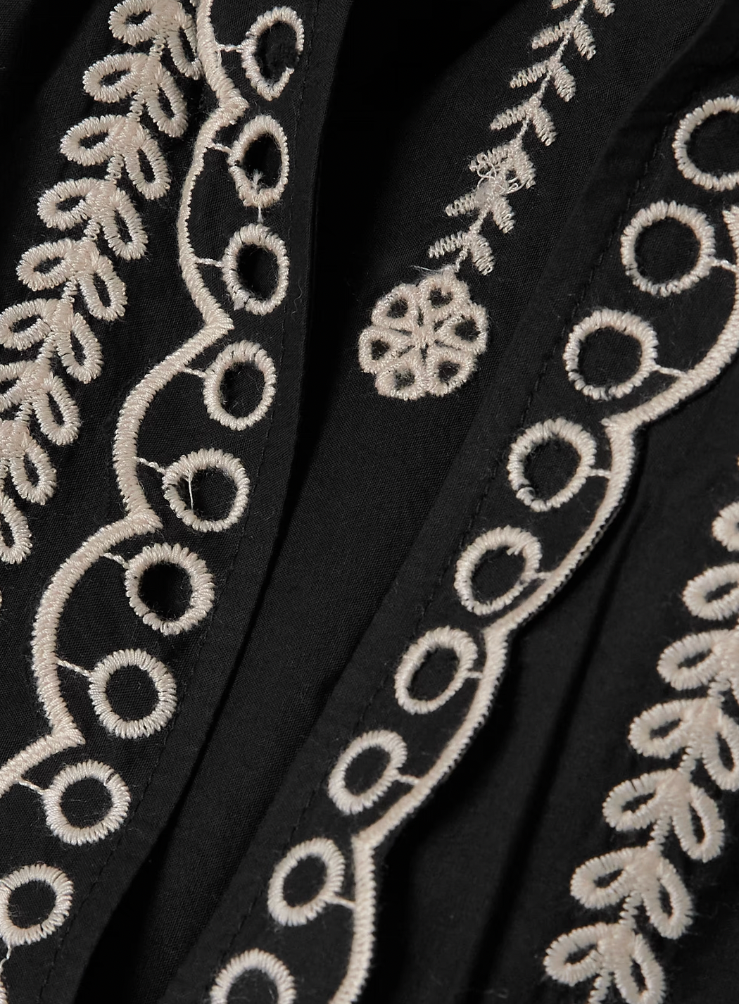 This Kingsley embroidered cotton-poplin blouse by SEA combines delicate craftsmanship with effortless style. Crafted from soft cotton-poplin, it features charming floral and bird embroidery alongside elegant swirling patterns. The loose fit enhances comfort, while scalloped edges and crocheted trims along the notched neckline add a touch of refined detail. Perfect for elevating any outfit with graceful ease.
