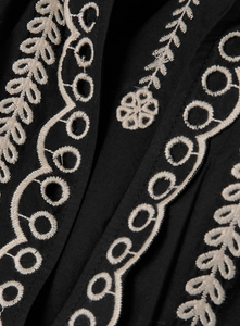 This Kingsley embroidered cotton-poplin blouse by SEA combines delicate craftsmanship with effortless style. Crafted from soft cotton-poplin, it features charming floral and bird embroidery alongside elegant swirling patterns. The loose fit enhances comfort, while scalloped edges and crocheted trims along the notched neckline add a touch of refined detail. Perfect for elevating any outfit with graceful ease.