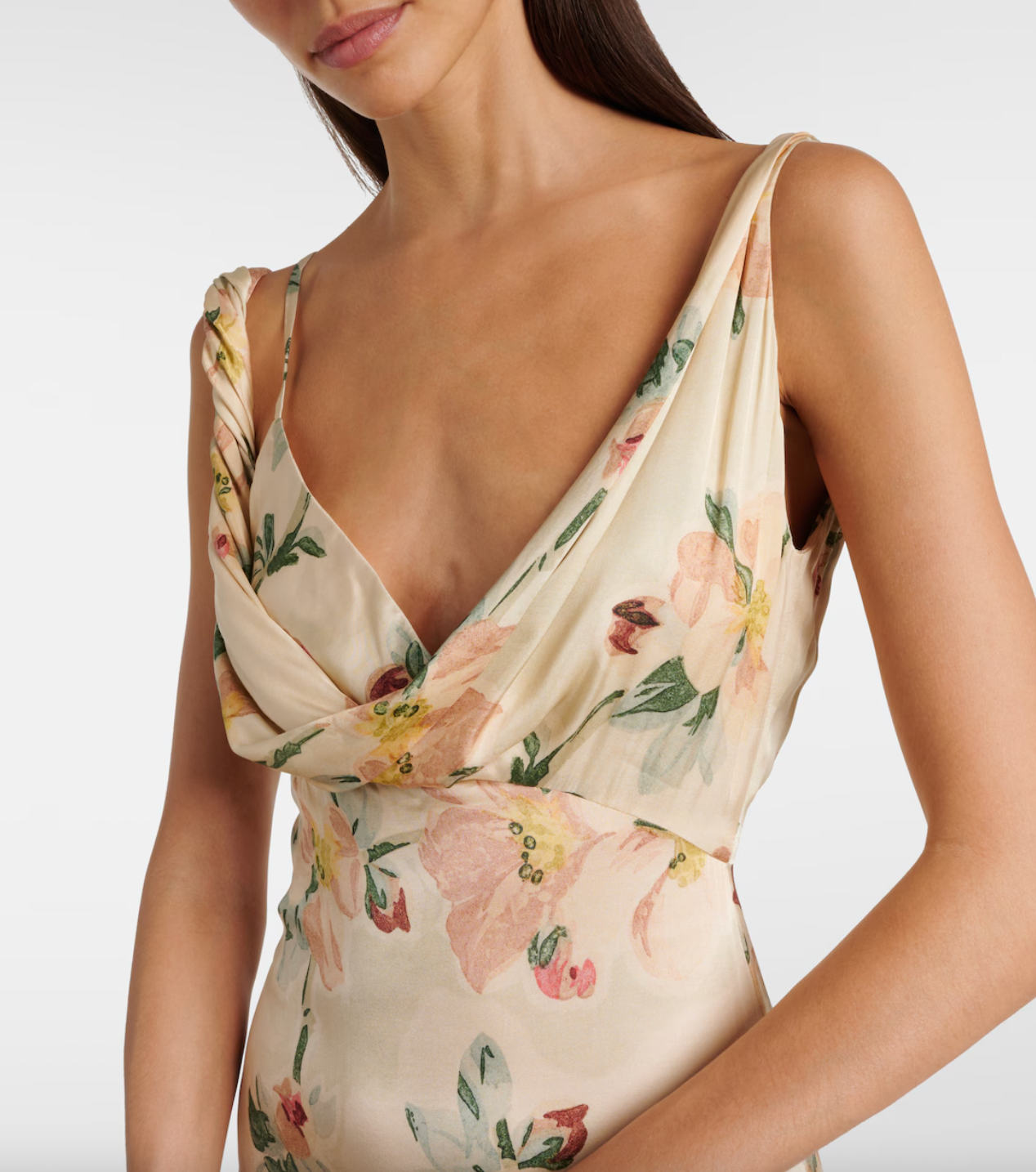 Indulge in luxurious elegance with our Floral Draped Maxi Dress by Toteme. The intricate floral print and draped design effortlessly elevate your style, while allowing for comfortable movement. Perfect for any occasion, this dress exudes sophistication and exclusivity. Experience the beauty of art and fashion with every wearing.