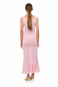 Make a statement with Andreeva's Knit Midi Dress, adorned with delicate feathers. The elegant round neck and figure-flattering design exude sophistication, perfect for any occasion. Elevate your style with heels or go for a more casual look with sandals or sneakers. Be confident and chic in this must-have dress.