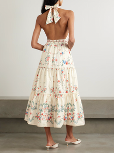 Crafted from breathable linen, the Consuelo Mosqueta Midi Dress from Agua by Agua Bendita features delicate embroidery of elegant blooms that enhance its refined aesthetic. Its flowing tiers offer effortless movement and a flattering silhouette, combining comfort with expert design that suits both casual and sophisticated occasions.