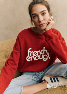 Stay comfy and stylish with this long-sleeved organic cotton sweatshirt. Show off your love for French culture with the "French Enough" print on the front, while staying cozy with the round neckline. Good for you and the environment.