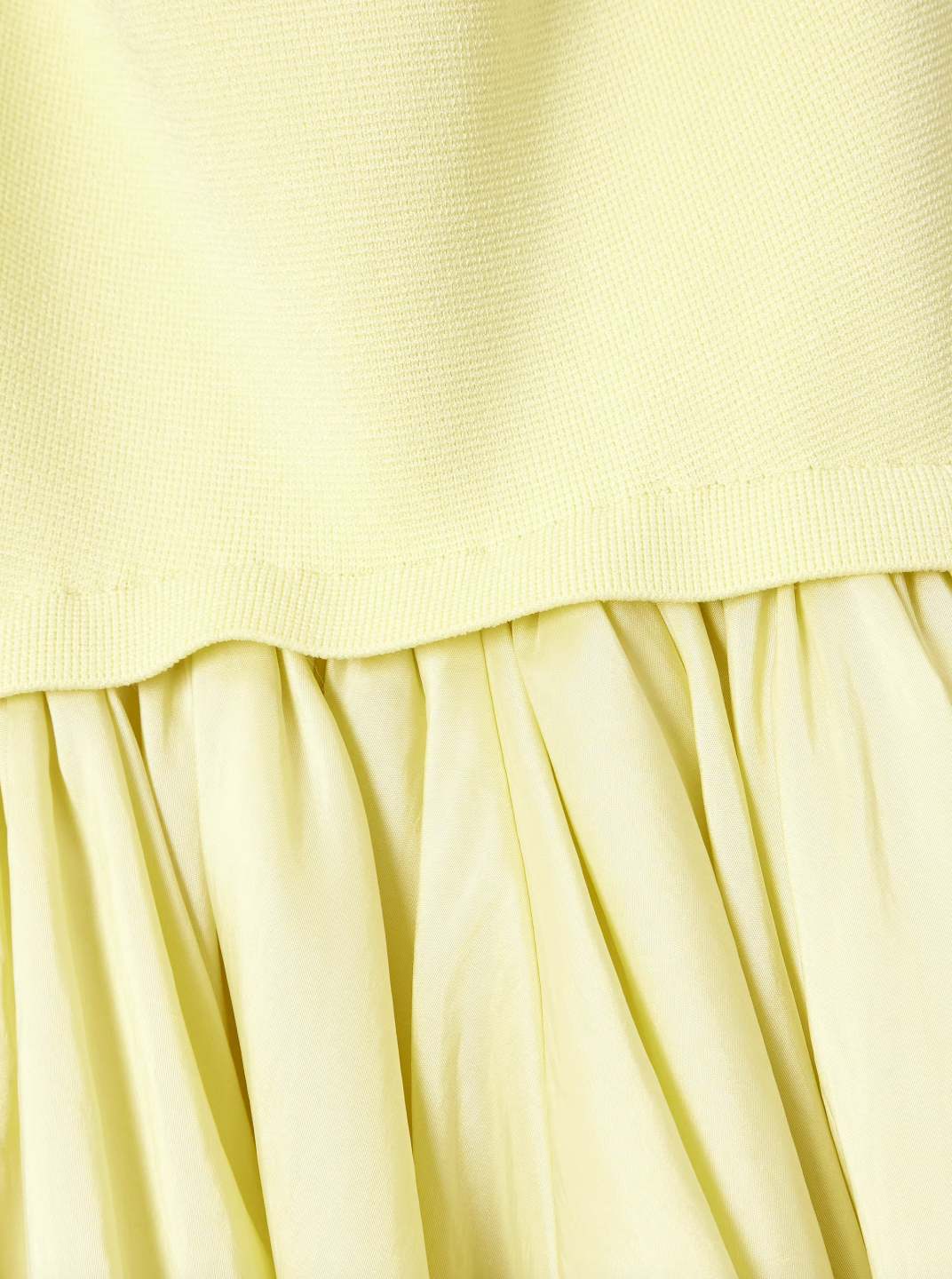 Experience elegance with SIMKHAI’s Izzy Stretch-knit and Gathered Taffeta Midi Dress. Featuring a fitted stretch-knit bodice and a voluminous taffeta skirt in a radiant Sunglow yellow, this strapless design sculpts your silhouette with a gathered waist and an eye-catching asymmetric bubble hem. Perfectly balanced and uniquely stylish, it’s an unforgettable choice for making a bold, sophisticated statement.