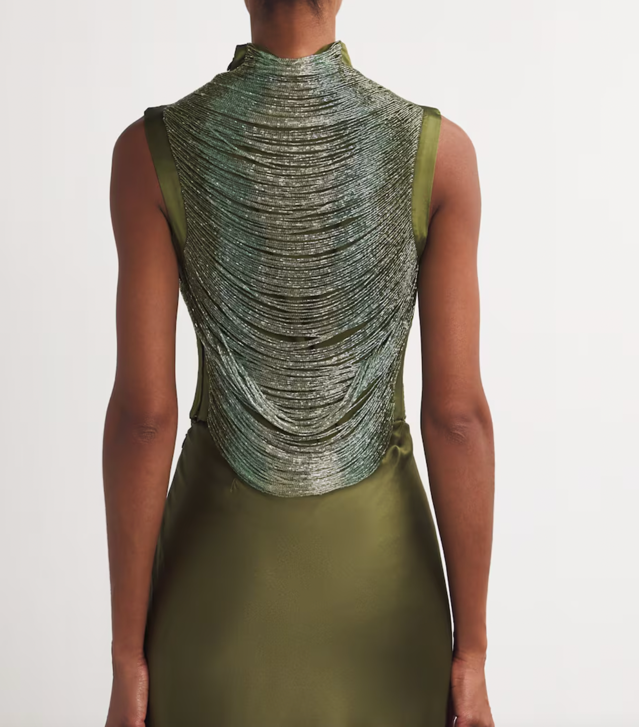 Elevate your wardrobe with the Multi Beaded Taraji Blouse by Cult Gaia, featuring exquisite hand-beaded arcs that highlight Cult Gaia’s commitment to artisanal excellence. The cedar-toned, stretchy side panels ensure a flattering fit while adding subtle contrast. Perfectly paired with the matching Chantel skirt, this blouse transforms any look with its intricate detailing and luxurious craftsmanship.