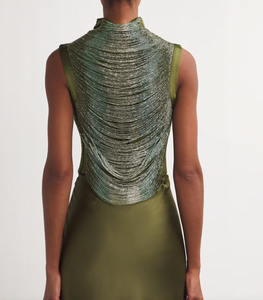 Elevate your wardrobe with the Multi Beaded Taraji Blouse by Cult Gaia, featuring exquisite hand-beaded arcs that highlight Cult Gaia’s commitment to artisanal excellence. The cedar-toned, stretchy side panels ensure a flattering fit while adding subtle contrast. Perfectly paired with the matching Chantel skirt, this blouse transforms any look with its intricate detailing and luxurious craftsmanship.