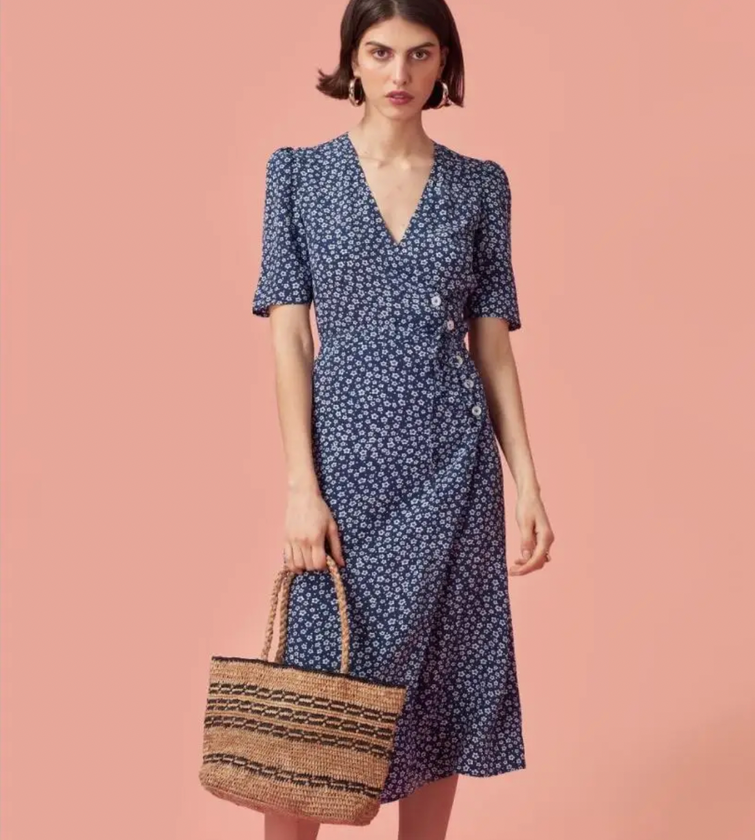 Indulge in the elegance of the Eloise Dress. Made with lightweight cotton, this floral-printed dress boasts a relaxed fit and short sleeves for effortless style. Perfect for any occasion, experience the luxury of comfort and beauty in one.