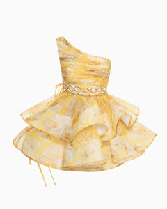The Iris Mini Dress by YVON combines premium linen silk fabric with a delicate yellow floral print inspired by fairy forest blossoms. Its handcrafted asymmetrical bodice enhances feminine contours with refined subtlety, while the adjustable waist lacing ensures a perfectly sculpted silhouette. This dress expertly merges romantic elements with sophisticated craftsmanship, making it an exceptional choice for those seeking elegance with distinctive style.