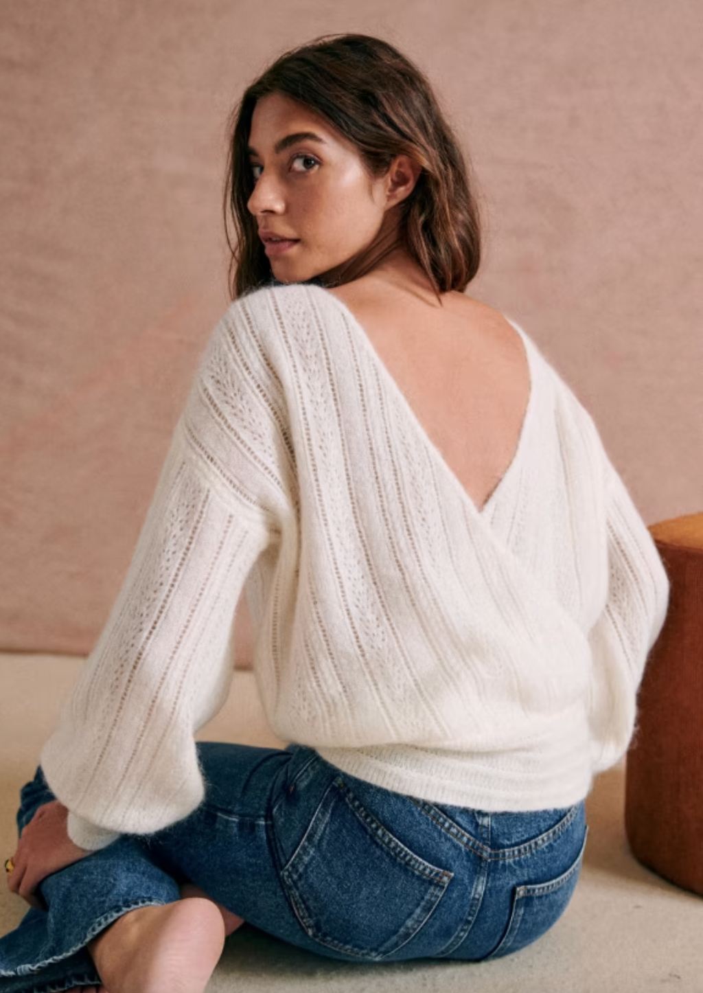 Stay cozy and stylish with the Cristina Jumper. Made from a luxurious blend of wool and kid mohair, this long-sleeved jumper features a fancy knitting technique and a unique covered heart shape. Its versatile V-neck design allows you to wear it with the opening in the front or back for added versatility.